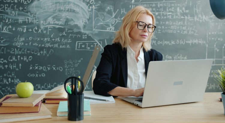 teacher reviewing TEFL diploma options