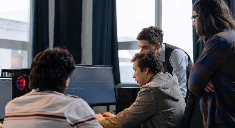 T professional reviewing network infrastructure in a business office